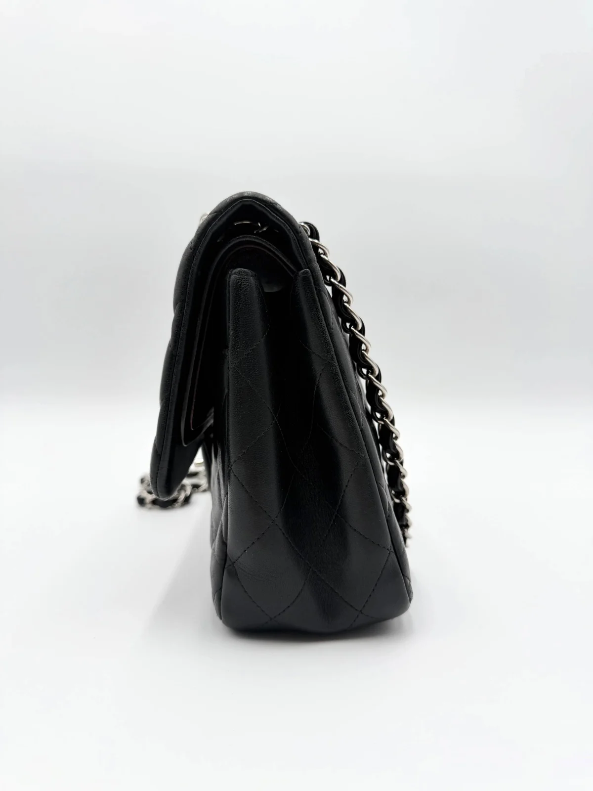 Black Chanel Jumbo Double Flap Bag in lambskin leather with silver-tone hardware