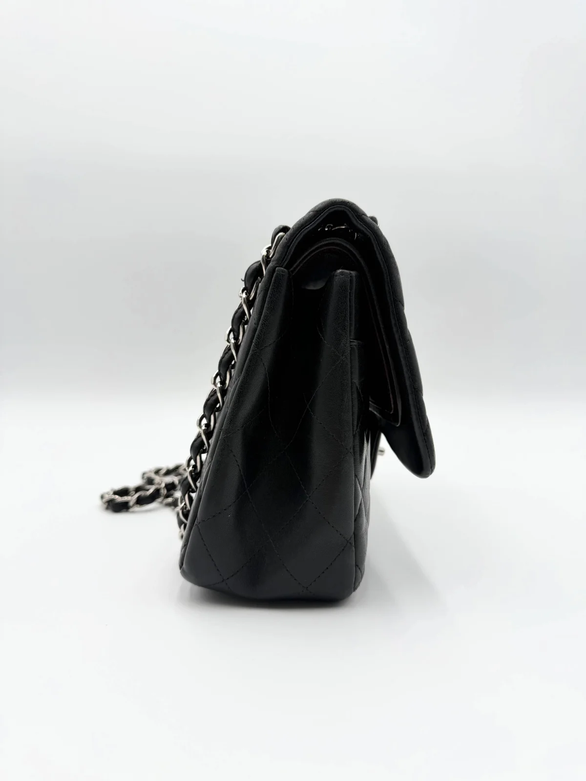 Black Chanel Jumbo Double Flap Bag in lambskin leather with silver-tone hardware