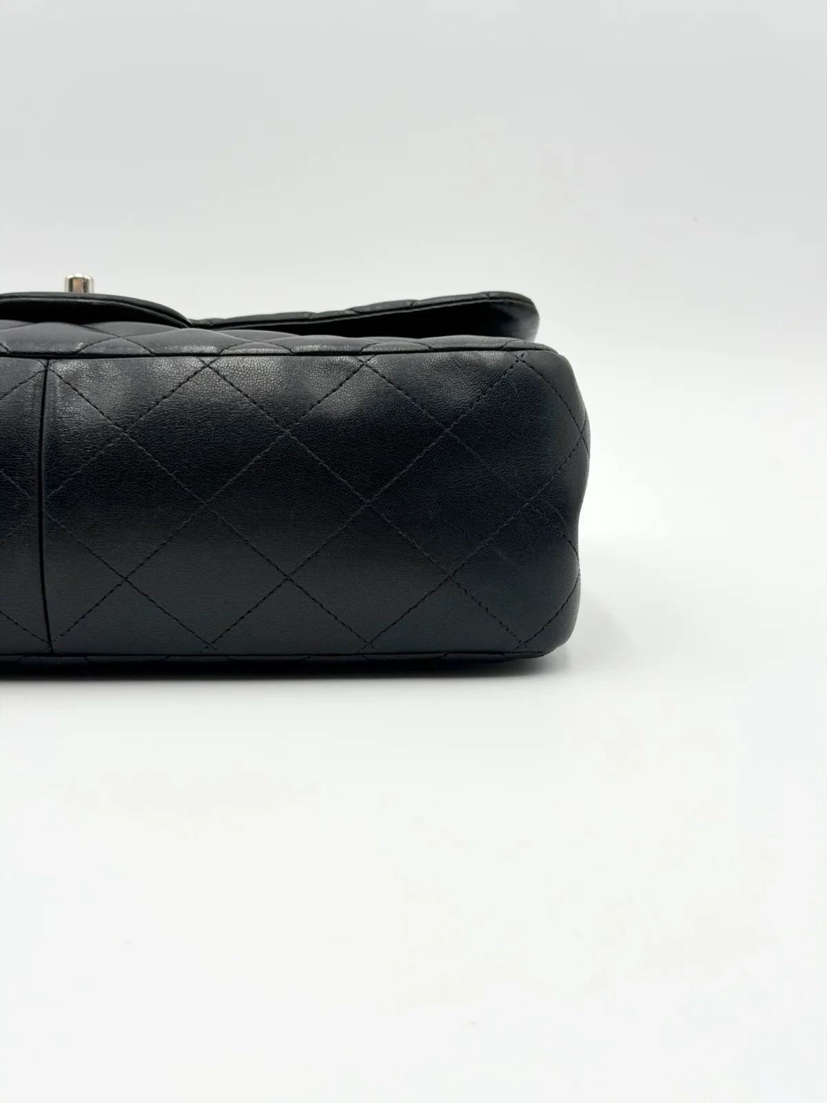 Black Chanel Jumbo Double Flap Bag in lambskin leather with silver-tone hardware