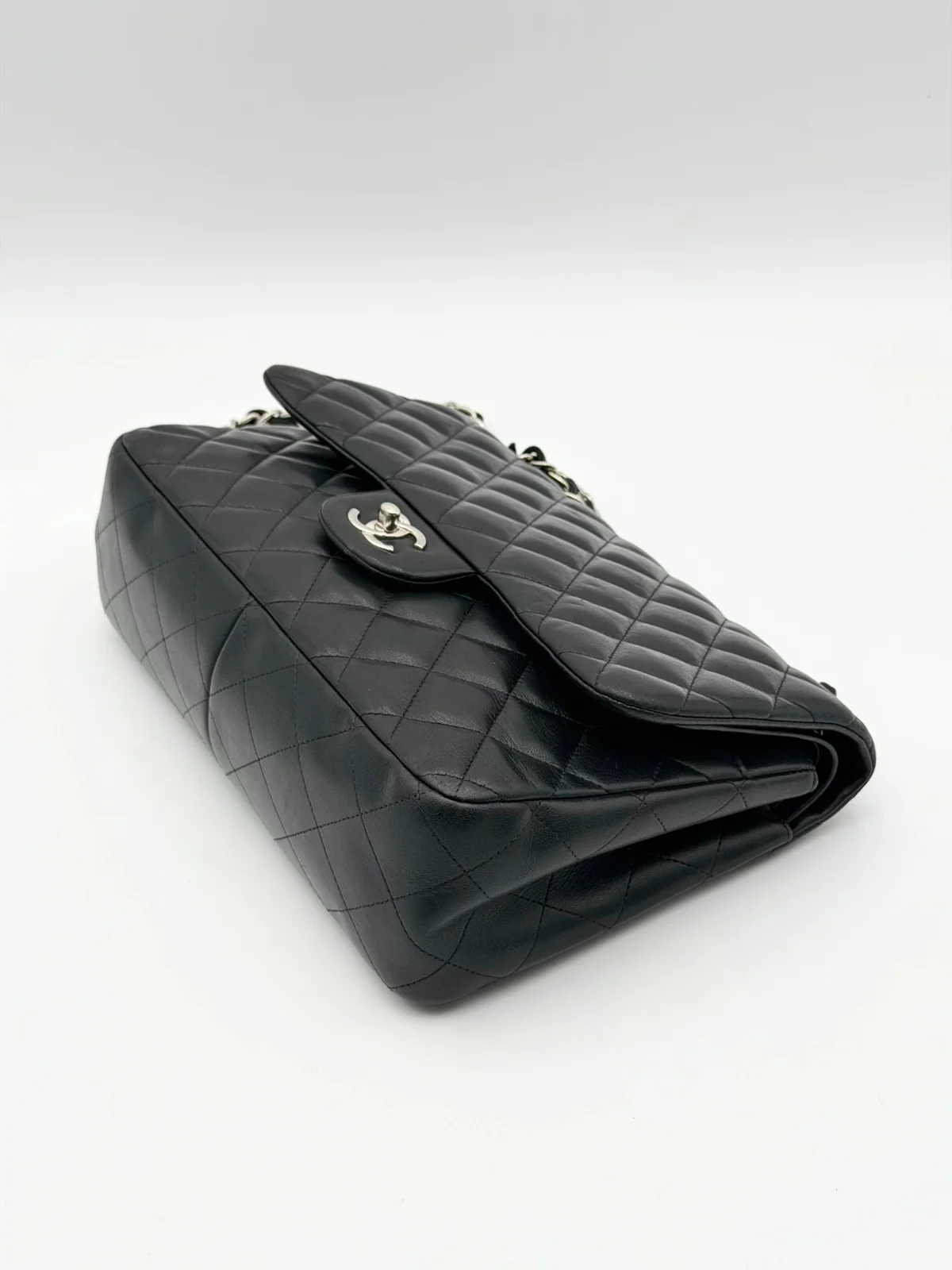 Black Chanel Jumbo Double Flap Bag in lambskin leather with silver-tone hardware