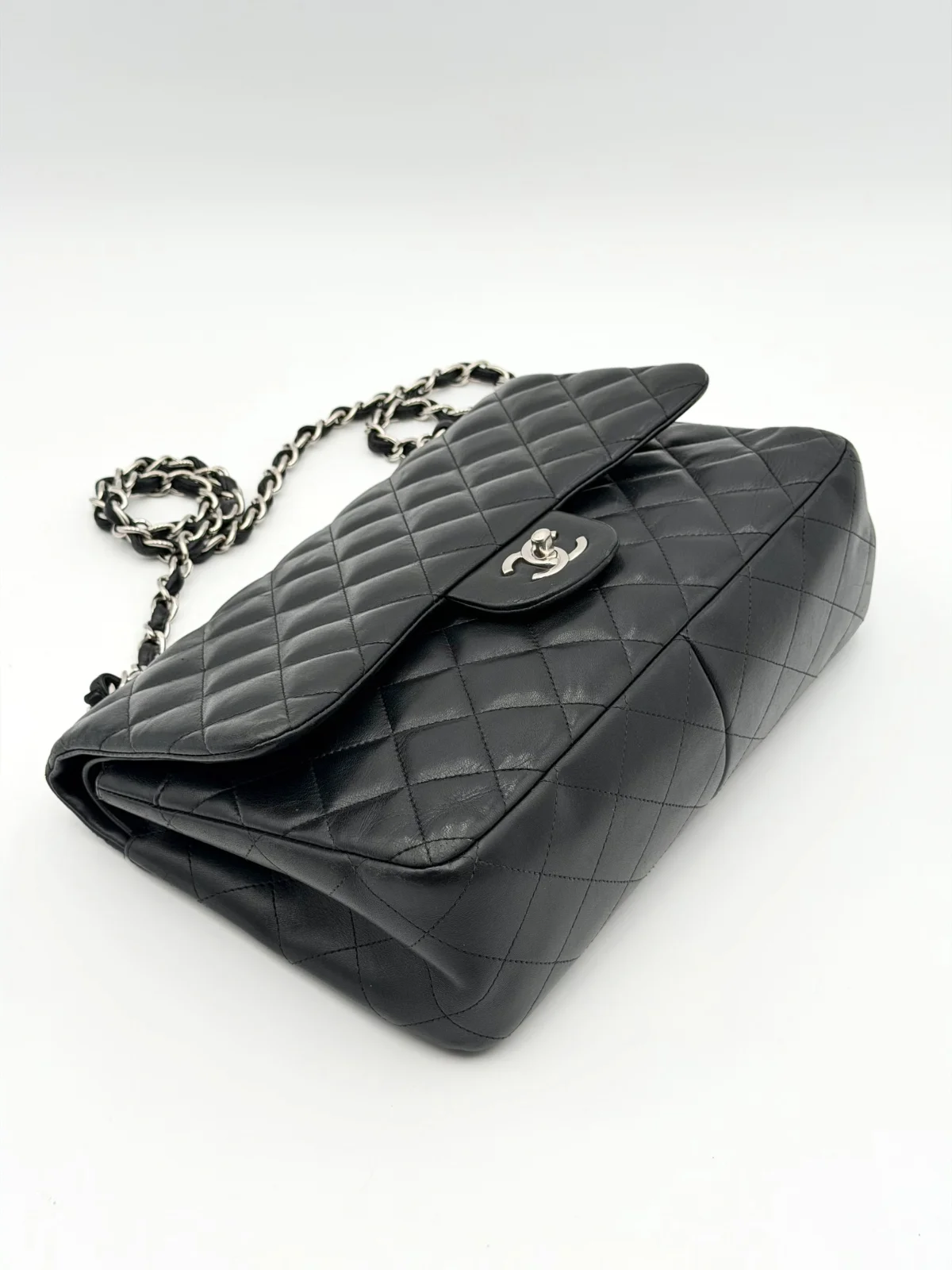 Black Chanel Jumbo Double Flap Bag in lambskin leather with silver-tone hardware