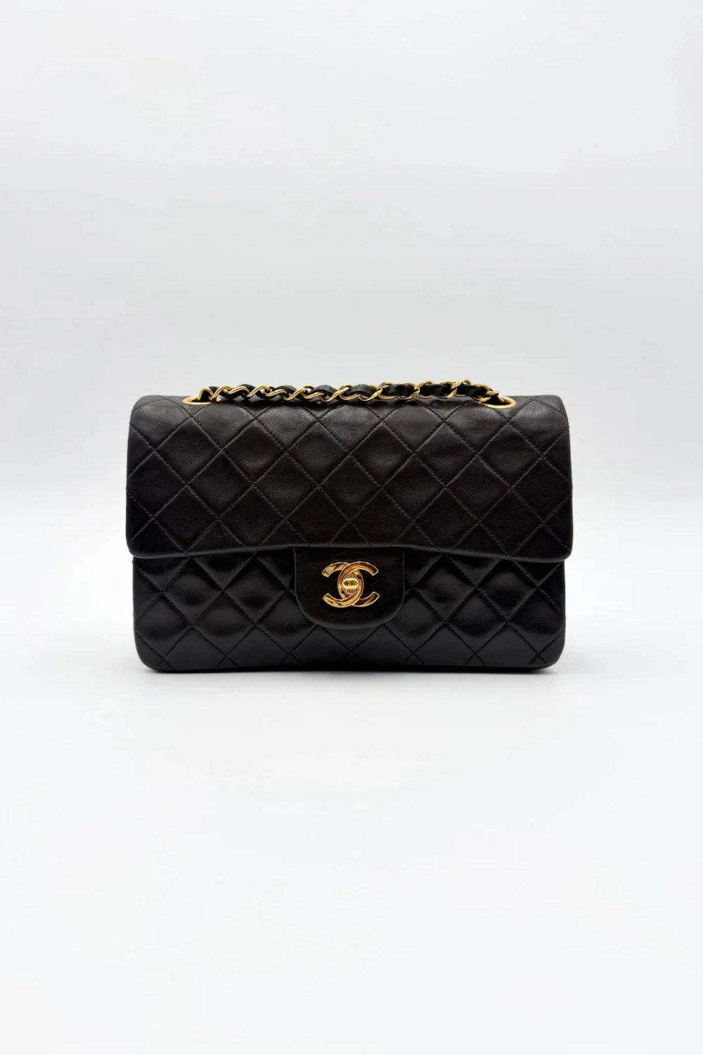 Black lambskin Chanel Small Double Flap Bag with gold-tone hardware