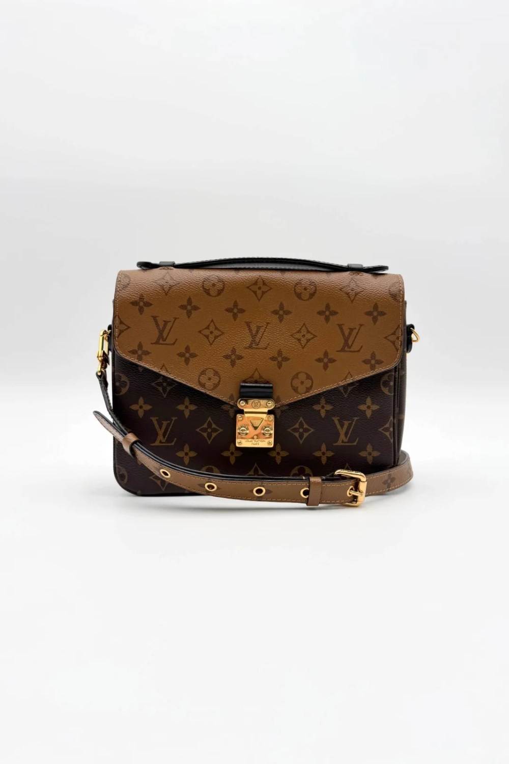 Brown Monogram Reverse Canvas Louis Vuitton Pochette Métis bag with gold-tone hardware