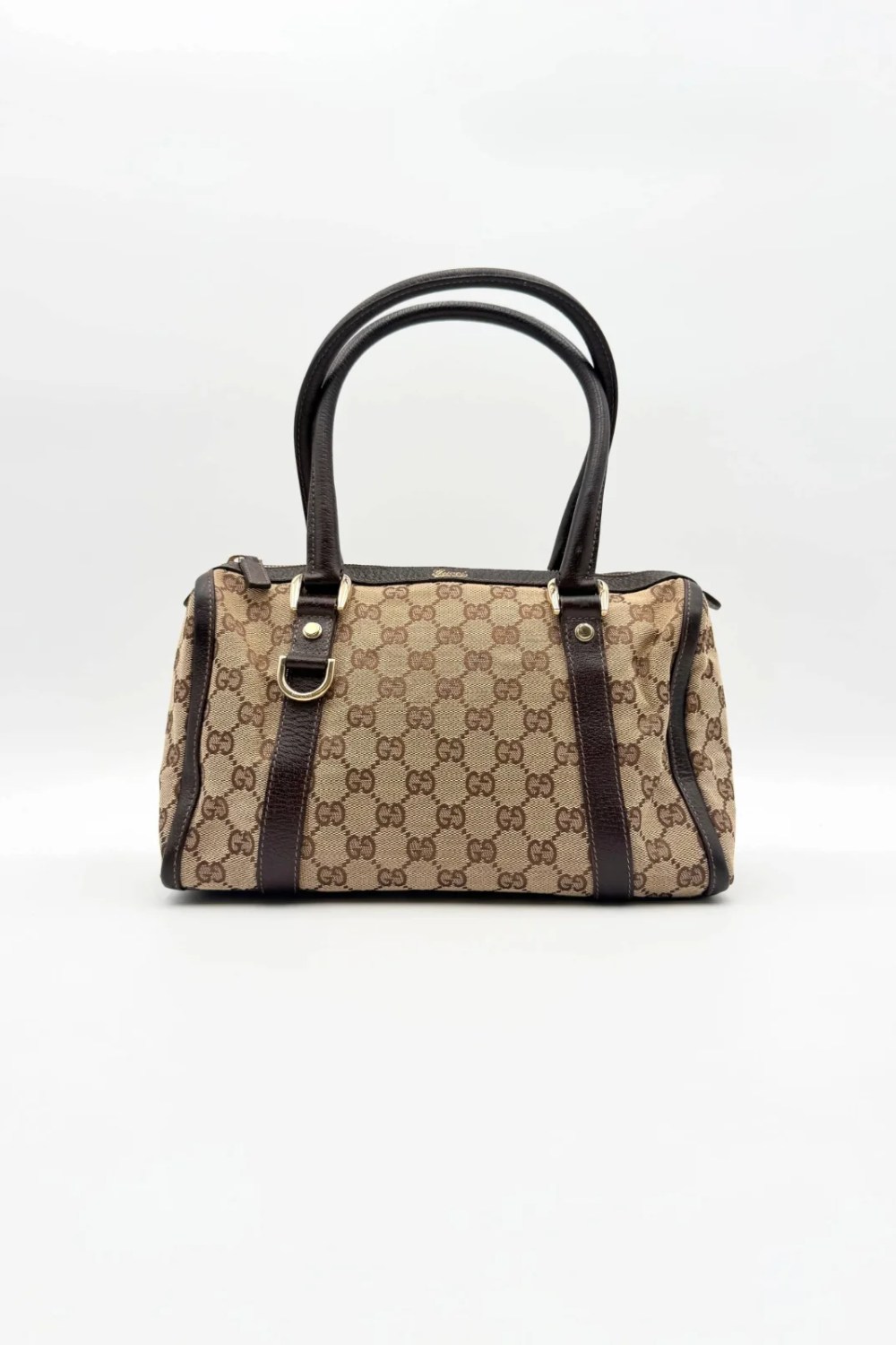 Gucci Abby Boston shoulder bag in brown GG canvas with champagne-tone hardware and a zip closure