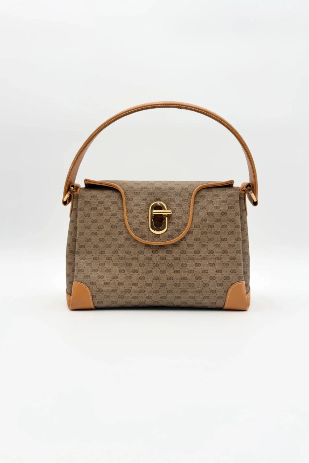 Gucci handbag in brown GG canvas with gold-tone hardware and a turn-lock closure